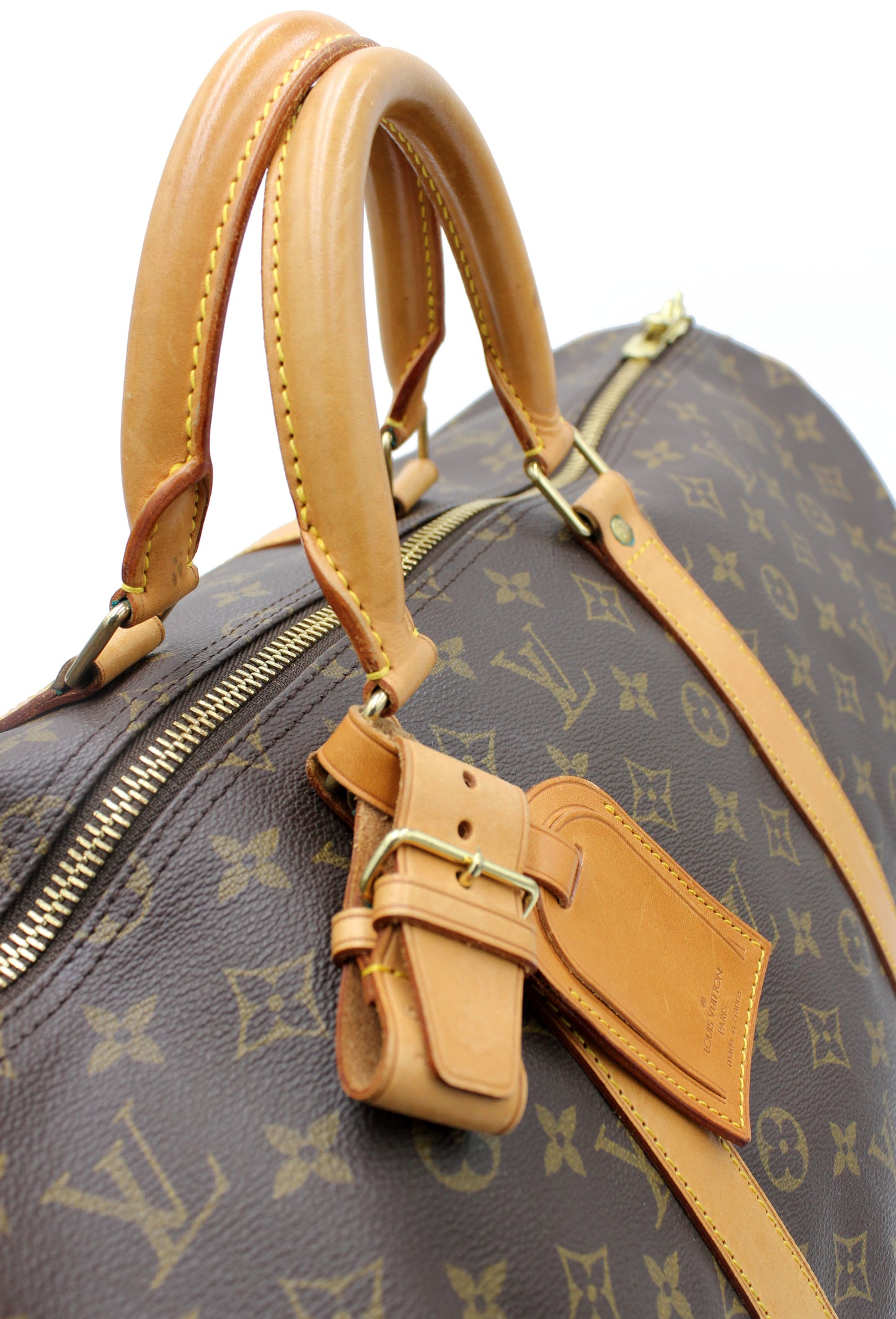 Louis Vuitton Keepall 55 (Duffle) with luggage tag