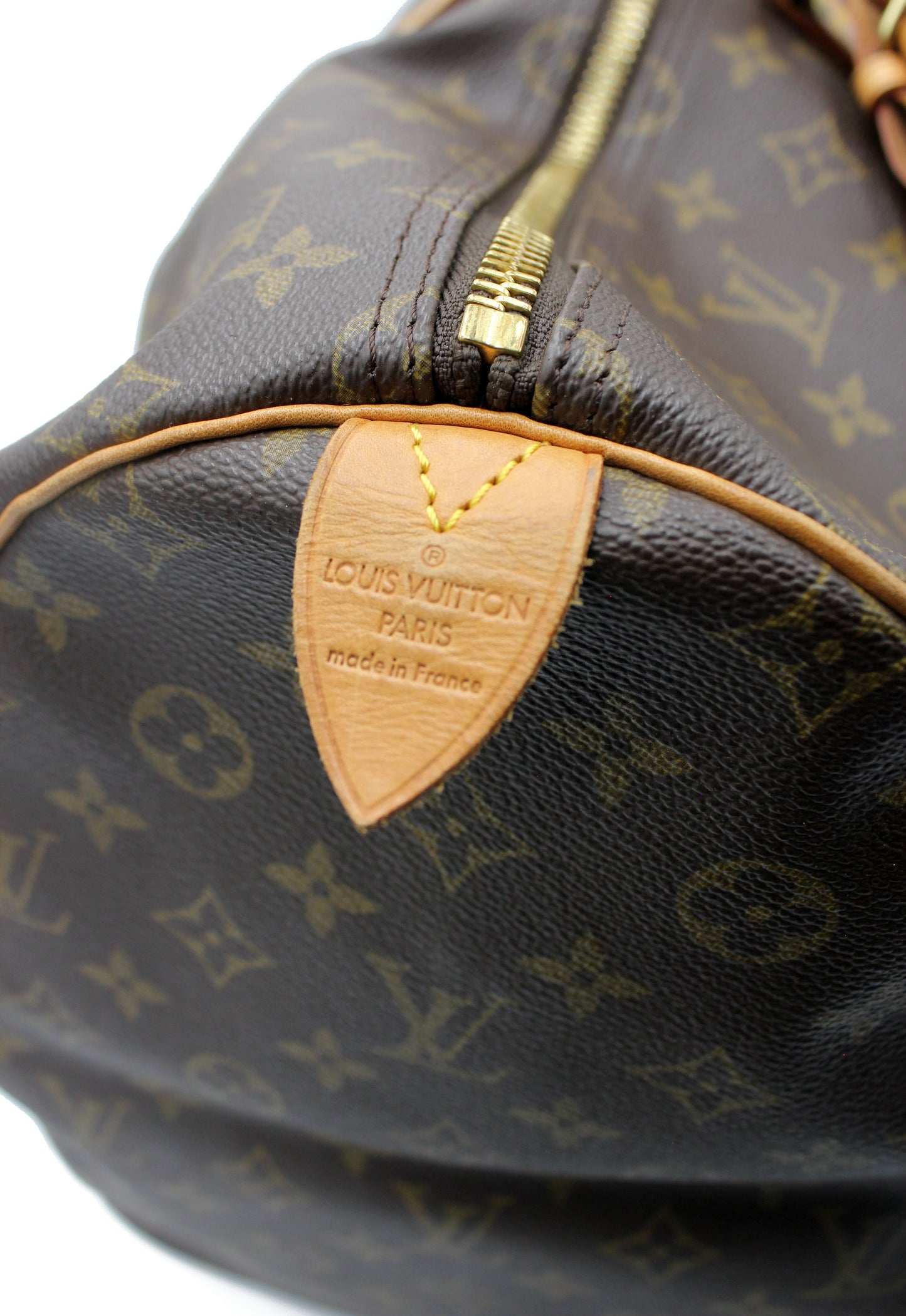 Louis Vuitton Keepall 55 (Duffle) with luggage tag