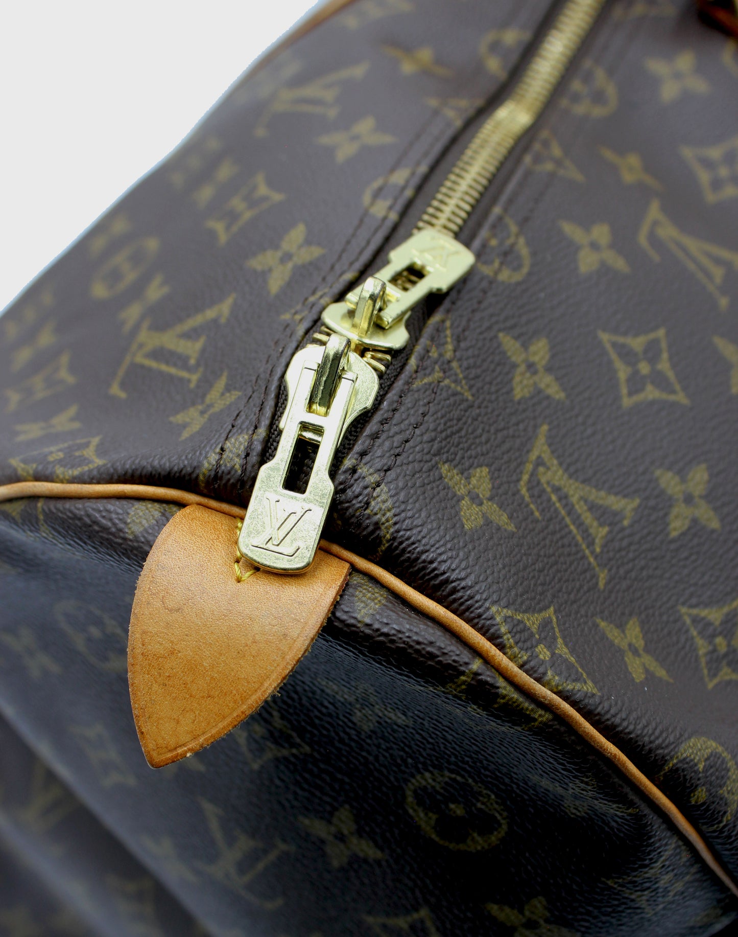 Louis Vuitton Keepall 55 (Duffle) with luggage tag